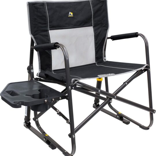 GCI Outdoor Freestyle Rocker XL in black, a portable folding camping chair with side table, drink holder, solid armrests, and a supportive backrest