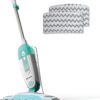Compact steam mop with swivel steering, removable tank, and reusable microfiber pads for fast, chemical-free floor cleaning.